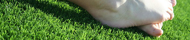 feet on the grass